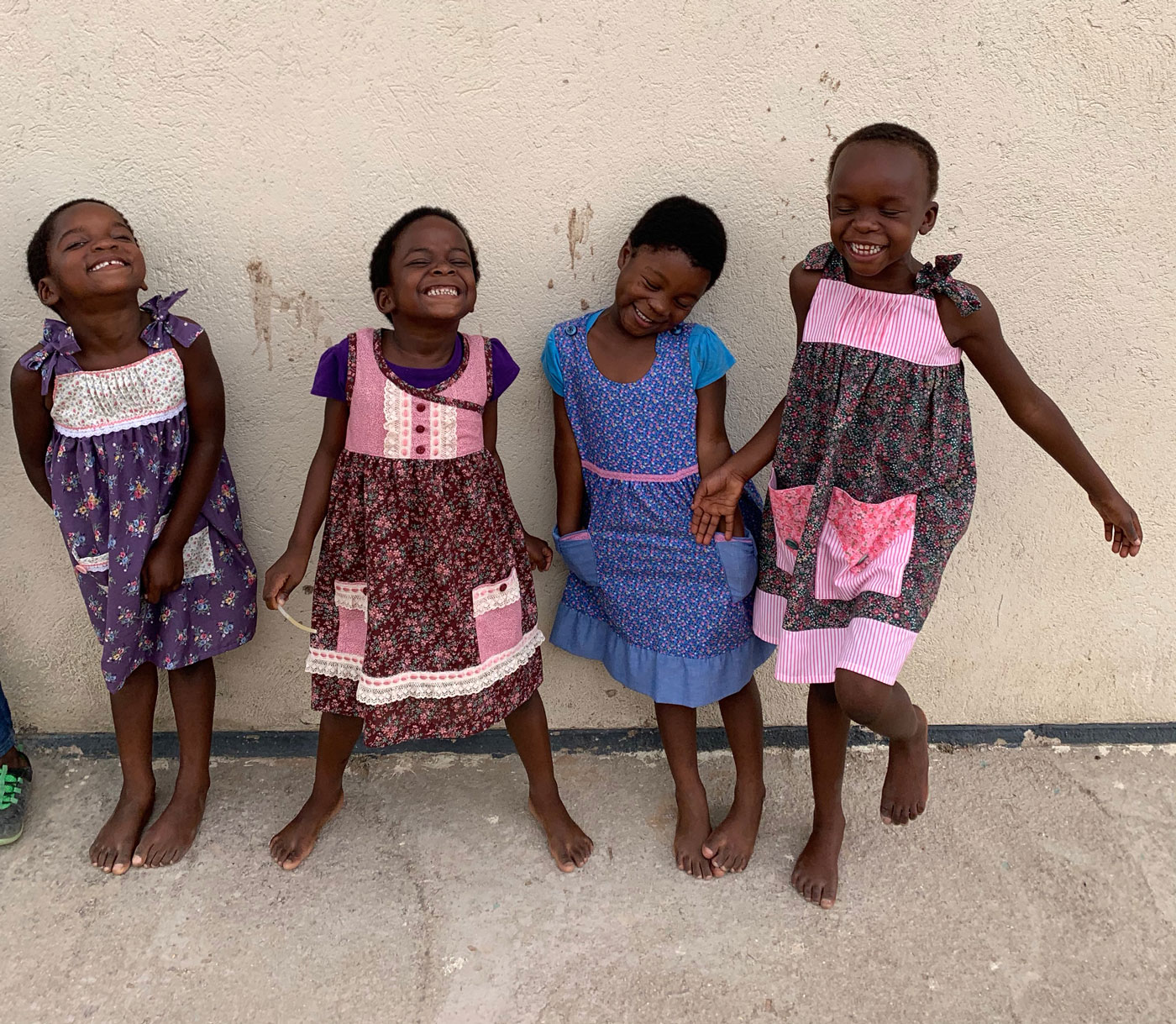 4-little-girls-in-dresses-laughing